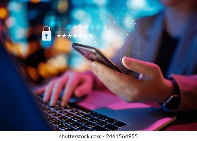 Lock the phone with a password for mobile cybersecurity or a password to confirm login in the online banking application. Cyber security threats. Laptop and smartphone. - Powered by Shutterstock