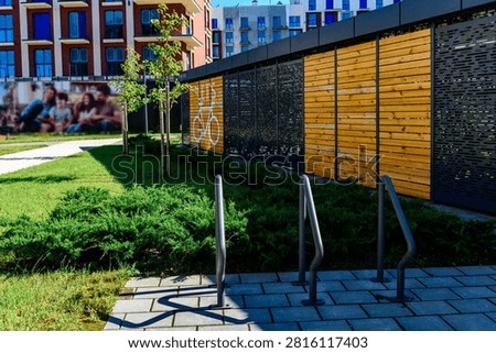 Lockable box with parking spaces for bicycles in residential buildings.