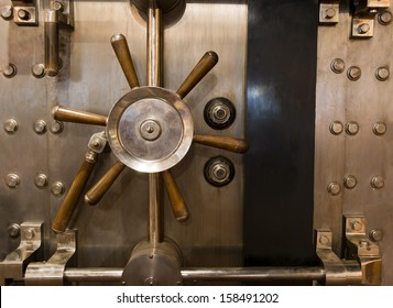 Locked bank vault door in retail store safe secure storage locker