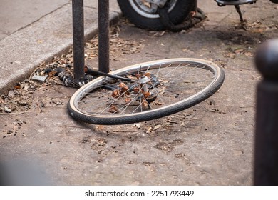 Locked bicycle wheel at bike parking - bike stolen