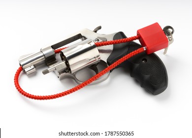 Locked Disarmed And Secured Revolver Gun On White Background