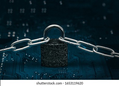 locked padlock with chain on computer motherboard
