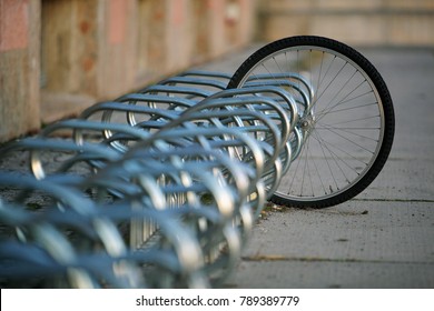 Locked Tire Of A Stolen Bike Left In A Bicycle Stand