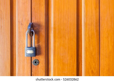 Locked wooden door, private zone as Home.