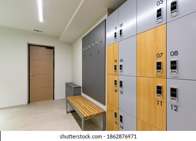 Locker Room Interior With Key Card Access To Locker In Gym Fitness Center