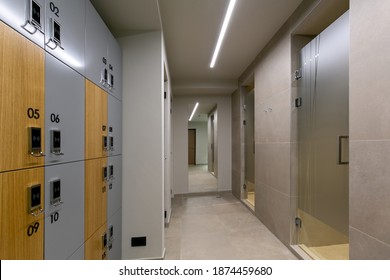 Locker Room Interior With Key Card Access To Locker In Gym Fitness Center