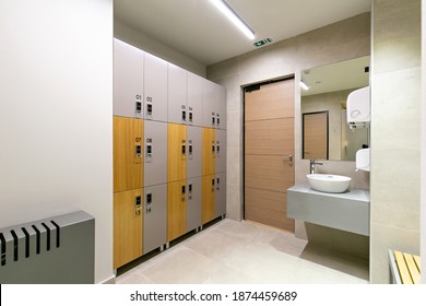 Locker Room Interior With Key Card Access To Locker In Gym Fitness Center