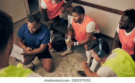 Locker room, strategy and rugby team with coach in discussion or game plan with motivation for winning. Training, coaching and focus, group of sports players planning teamwork with leader together. - Powered by Shutterstock