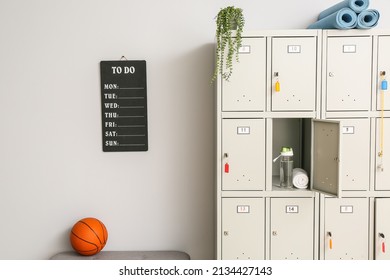 Locker With Sport Equipment In Change-room