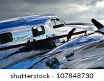 Lockheed Electra Jr. - A perspective view of a vintage Lockheed Electra Jr.. A polished and shiny fuselage; the essence of the golden era of aviation.