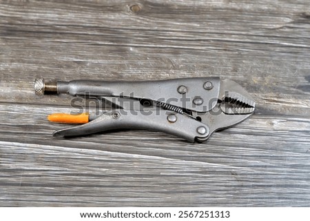Locking pliers, hand tools set, various tools like ring spanners, combination wrenches and spanner, angled socket wrenches, pliers, nippers, pincer, pipe and locking pliers, screwdrivers