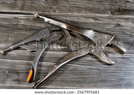 Locking pliers, hand tools set, various tools like ring spanners, combination wrenches and spanner, angled socket wrenches, pliers, nippers, pincer, pipe and locking pliers, screwdrivers
