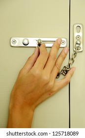 Locking up or unlocking door with hinge in hand