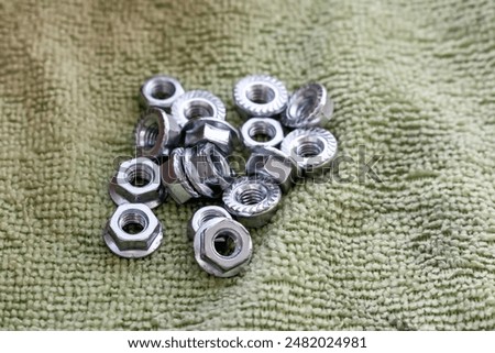 locknut hex pile on background for threaded connection