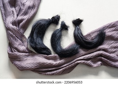 Locks Of Hair And Head Scarf