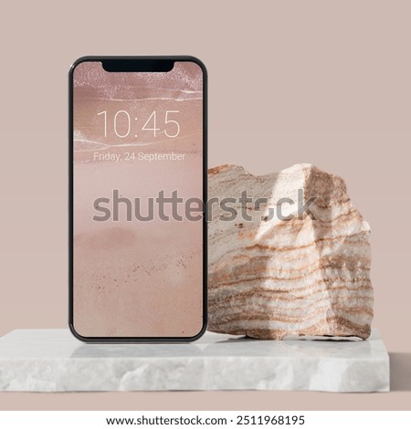 Lockscreen date on a smartphone screen, modern pink background