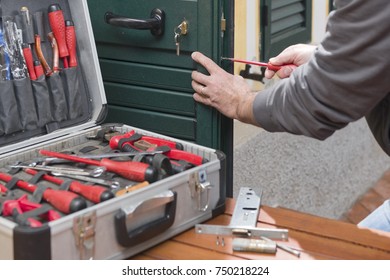 Locksmith Repair A Door Lock Replaces The Lock And Fixes The Screws.