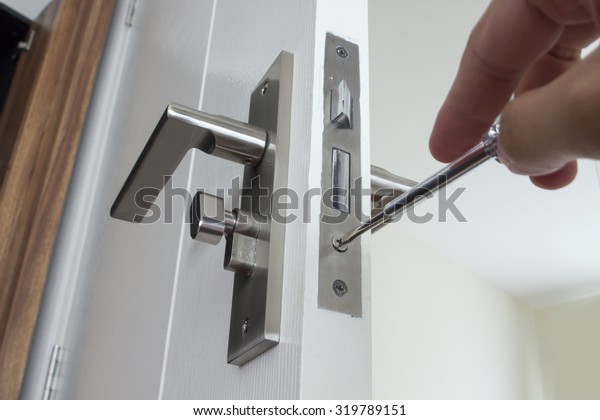 Locksmith\
repair or install the door lock in\
house.