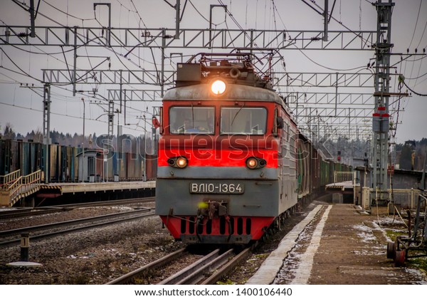 Locomotive\
rides outside the city. Shipping. Russian railway. Railway in the\
fall. Locomotive rides in the fall. . Russia Leningrad Oblast,\
Troopskovitsy Station on November 23,\
2018