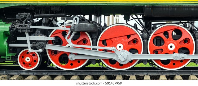 Locomotive Side View. Panorama Shoot Of Big Loco Wheels