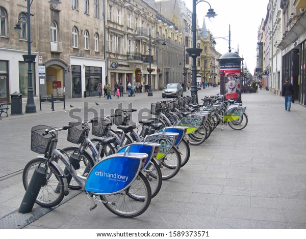 Lodz /\
Poland. 18 July 2019: \
View of city street with many bicycles.\
City life in Lodz. Busy traffic on streets of Polish city of Lodz.\
Central street of Lodz Piotrkowska street.\
