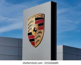 Lodz, Poland - 1st May 2022 : Porsche Dealership Sign Logo Store German Automobile Manufacturer Specializing In High-performance Sports Cars Shop