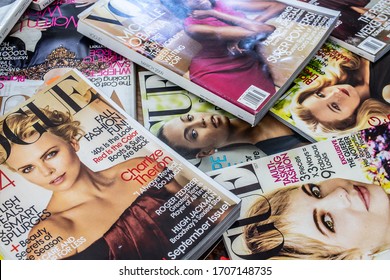 Lodz, Poland, April 18, 2020 a stack of American Vogue fashion magazines, cover with actress Charlize Theron from Vogue US September 2009