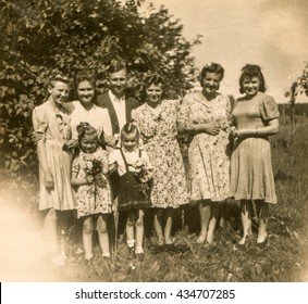 LODZ, POLAND, CIRCA 1940's: Vintage Photo Of Family Outdoor