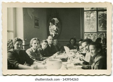 LODZ, POLAND, CIRCA FIFTIES - Vintage Photo Of People Enjoying A Family Dinner, Lodz, Poland, Circa Fifties