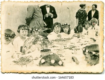 LODZ, POLAND - CIRCA THIRTIES: Vintage Photo Of First Communion Party, Lodz, Poland, Circa Thirties