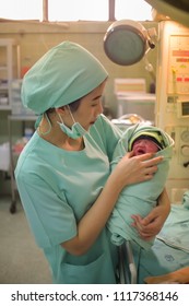 Loei, Thailand, June - 21, 2018 : Nurse Takes Care For A Littel Baby In The Obstetrics And Gynecology Hospital