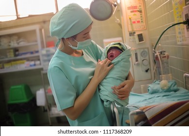 Loei, Thailand, June - 21, 2018 : Nurse Takes Care For A Littel Baby In The Obstetrics And Gynecology Hospital