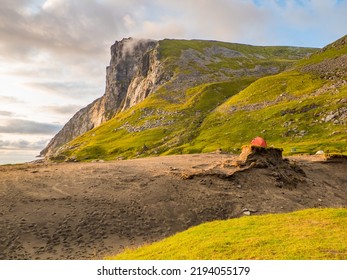 Lofoten, Norway - August 2019; Red Tent On The Kvalvika Beach, Lofoten, Northern Norway. Northern Europe. Scandinavia.