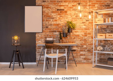 Loft Apartment With Brick Wall, Desk, Chair, Chalkboard, Lamp, Plants