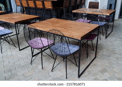 Loft Countertop Stands On The Street, Designer Furniture For A Summer Cafe, A Wooden Table, A Restaurant On The Sidewalk, Food On The Street, No People. High Quality Photo