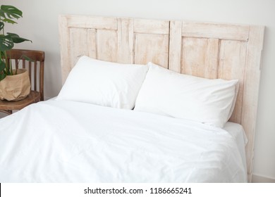 Loft Design. Scandinavian Interior Room. White Bed Linen.
