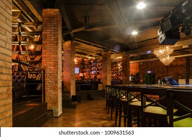 Loft style decorated restaurant-bar interior photo