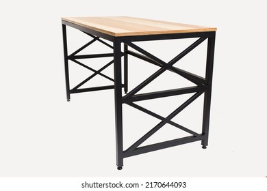 Loft-style Table Made Of Black Metal Pipe And Wooden Top. Office Furniture. Table With Metal Frame And Wooden Top. Modern Furniture In Loft Style. Furniture Isolated On White Background. Office Table