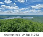 Lofty view of Canada lake from a firetower.