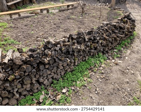 log arch, and while  it’s defying gravity, it relies on some very specific physics and likely bit of hidden support to keep from collapsing on someone's head. ​If you’re interested in how this works or how to build something similar
