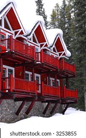 Log Building Of A Mountain Lodge In Winter At Ski Resort