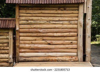 Log Cabin Or Barn Unpainted Debarked Wall Textured Horizontal Background With Copy Space.