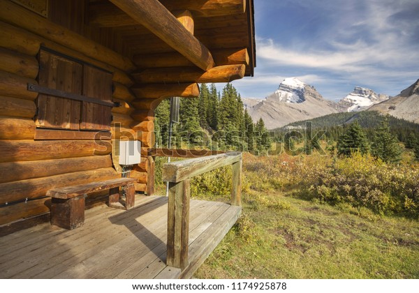 Log Cabin Distant Snowy Rocky Mountain Buildings Landmarks Stock