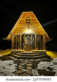 Log cabin on Tara mountain in the Christmas time - Shutterstock ID 2297939095