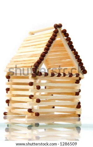 Log house from matches pattern isolated on white paper