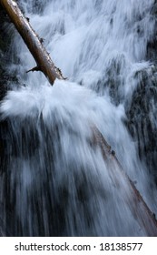 Log interrupting a waterfall