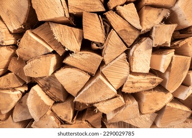 Log spruce trunks pile. Sawn trees from the forest. Logging timber wood industry. Cut trees along a road prepared for removal. High quality photo