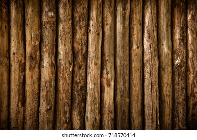 A Log Wall. Wooden Wall From Old Logs