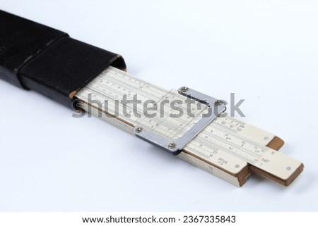 Logarithmic ruler on white background. Stationery for engineers and students
