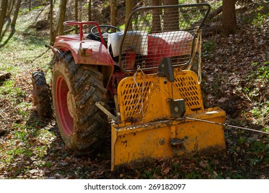 Logging Tractor With An Anchor Winch In The Forest